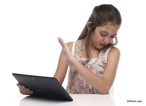I don´t want to see that! Parental Control. Pre-teen girl with a tablet pc