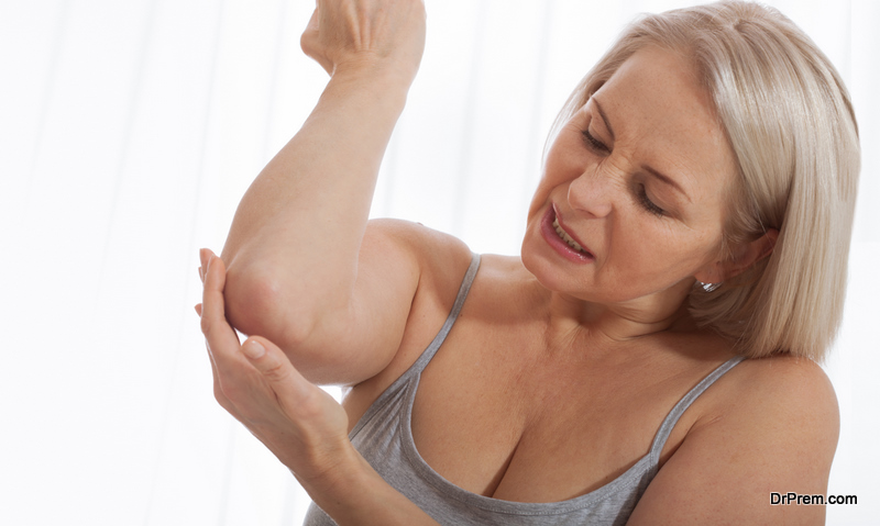 Woman with pain in arm